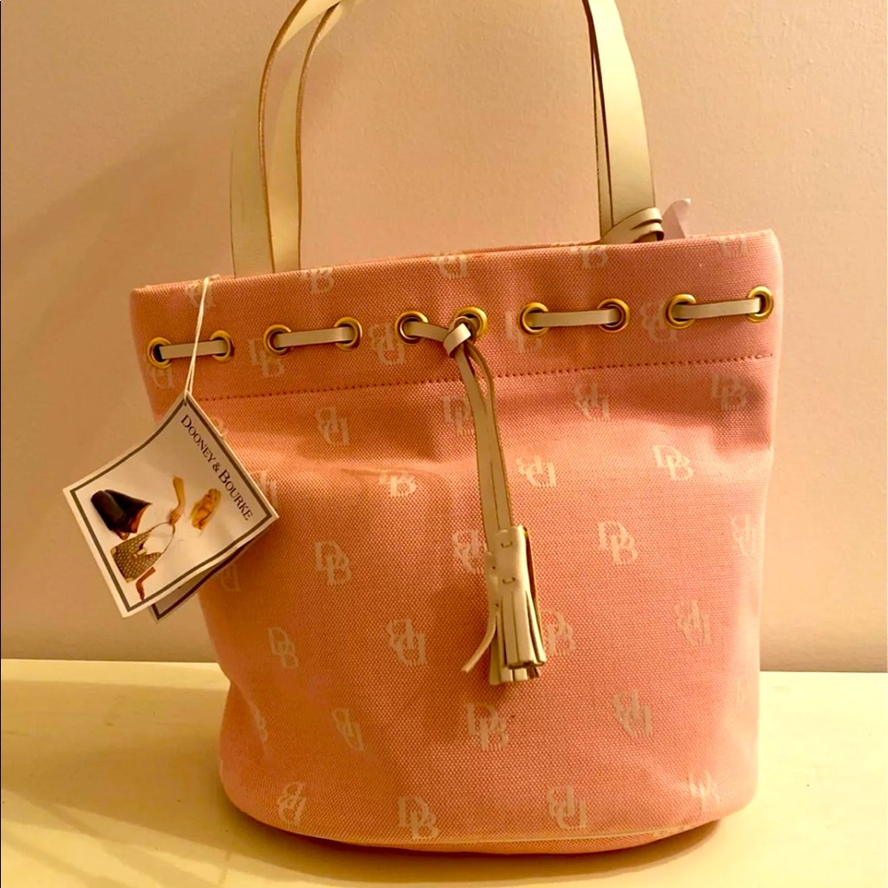 Dooney pink drawstring bucket purse. Just in time for Valentine’s Day NWT